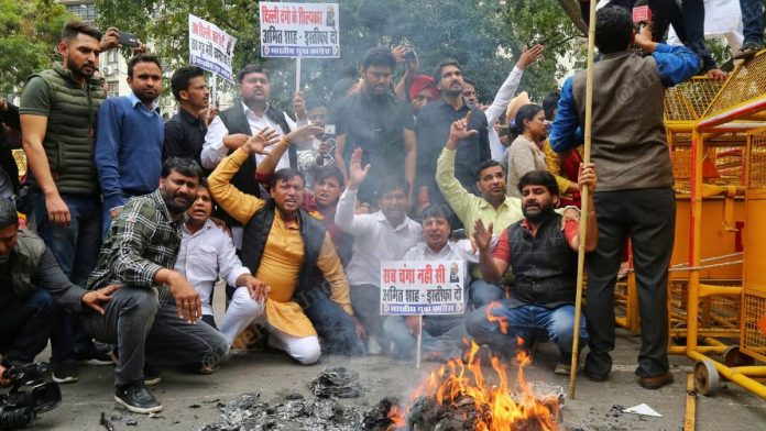Youth Congress holds protest over Delhi riots, seeks Amit Shah’s resignation
