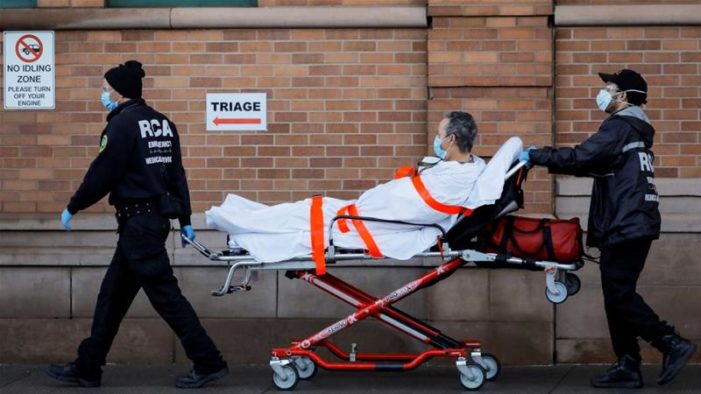 US coronavirus deaths set single-day record as total hits 28,300
