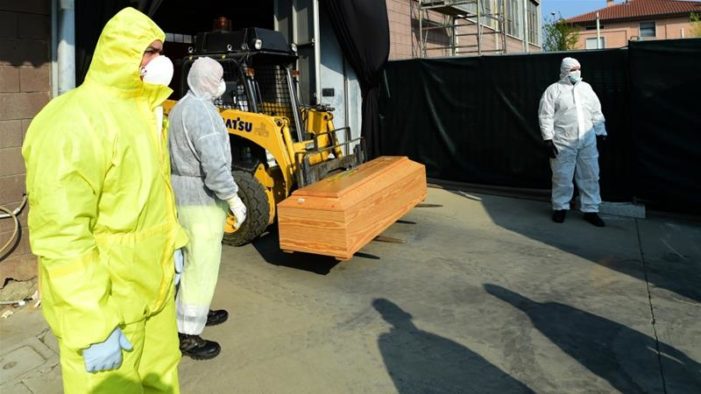 WHO warns against easing restrictions as deaths top 100,000
