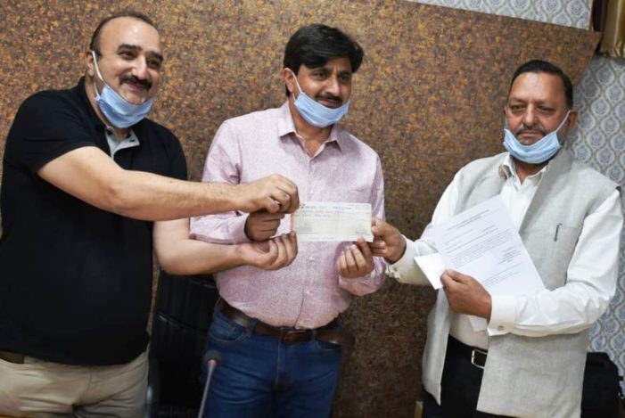 Administrator Auqaf donates 14.50 lakh in DDMF