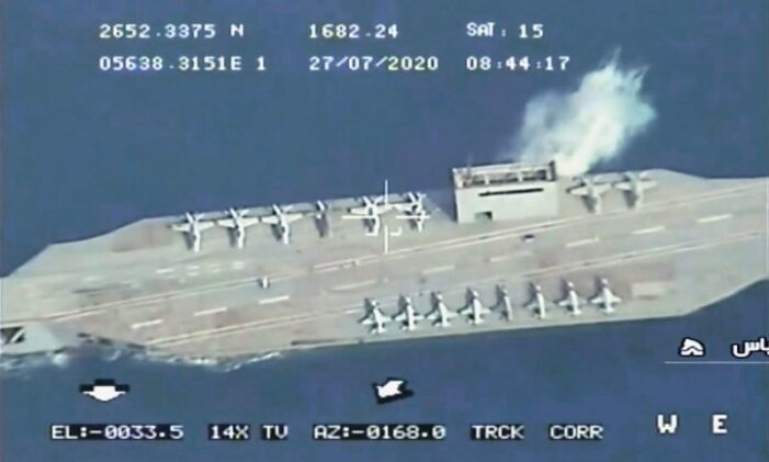 Iran batters dummy US aircraft carrier in Gulf exercises