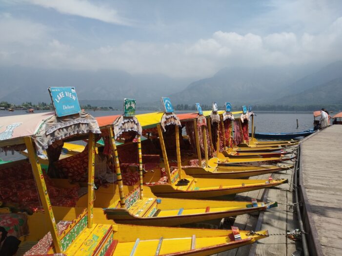 Waiting for tourists hundreds of Shikara Wallas without work on Dal Lake