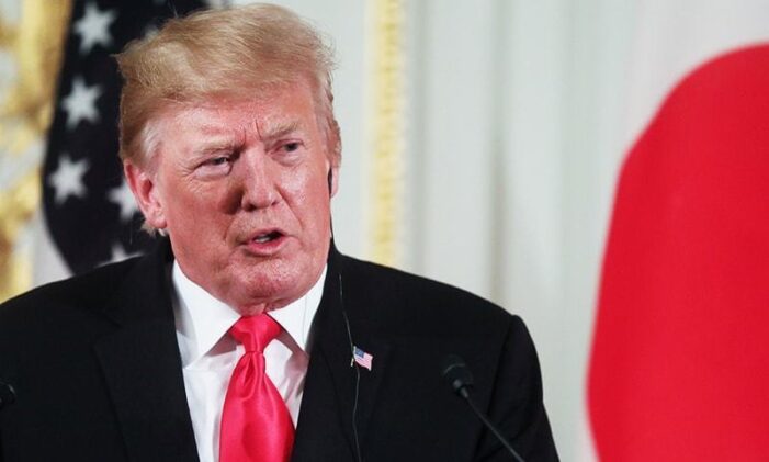Some criminal charges against Trump dismissed