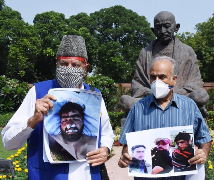 In parliament, NC leaders protest against “fake encounters and custodial killings”