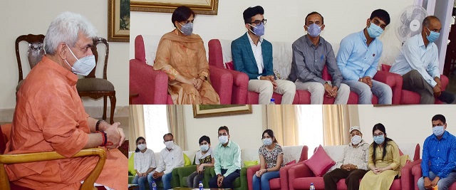 Lt Governor meets J&K NEET topper Avikshit Gupta, 4 others