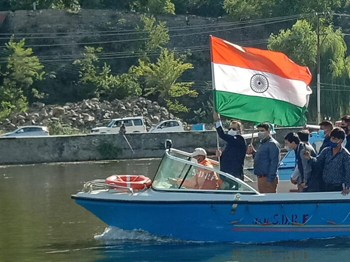 Advisor Baseer Khan flags off shikara rally in Dal Lake