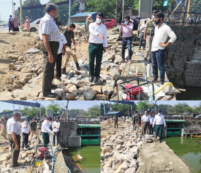 DC Srinagar inspects restoration work on road along Boulevard at Dalgate DC Srinagar inspects restoration work on road along Boulevard at Dalgate