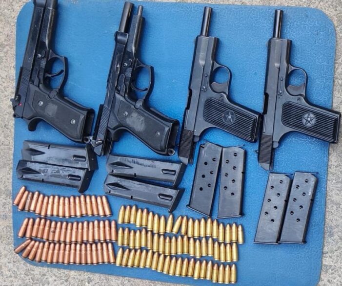 Four pistols, ammunition recovered during search ops in Pulwama village Four pistols, ammunition recovered during search ops in Pulwama village