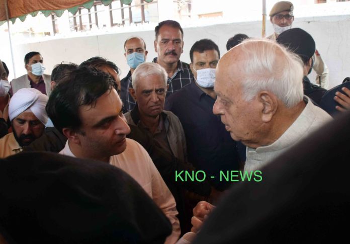 Farooq pays rich tributes to Bindroo medicate, visited his family Farooq pays rich tributes to Bindroo medicate, visited his family