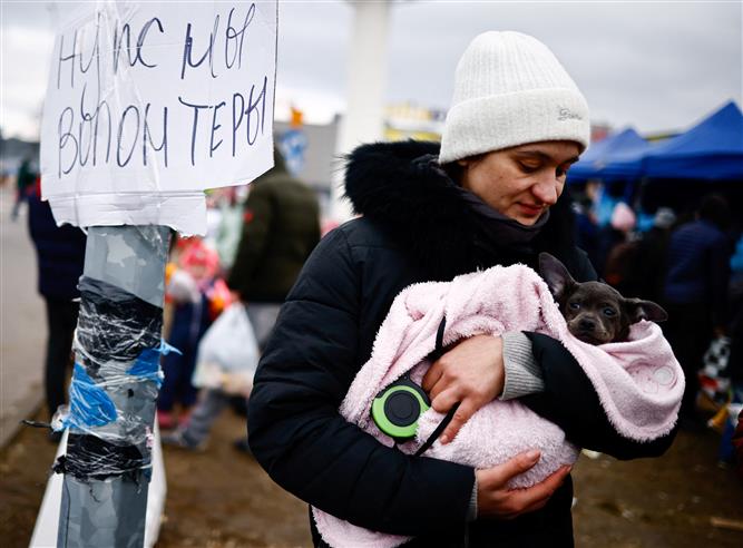 Ceasefire talks begin between Kyiv and Moscow as Russian forces seize two cities in Ukraine