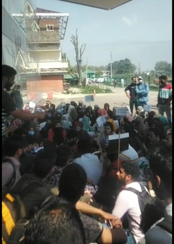 Kashmir University students protest against the alleged assault on Dean of Social Science