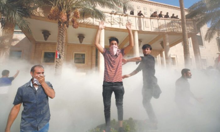 12 killed in Baghdad clashes as Moqtada Sadr loyalists storm complex