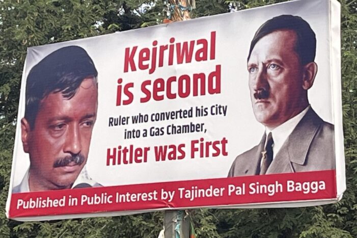 Poster comparing Kejriwal to Adolf Hitler put up outside BJP headquarters in Delhi