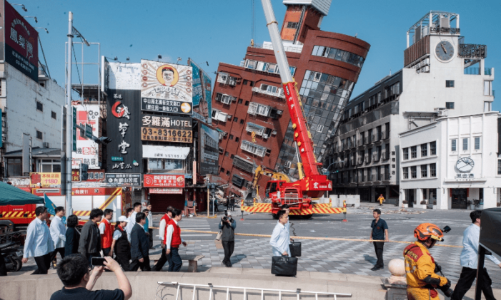 Helicopter plucks miners to safety as Taiwan searches for missing after quake